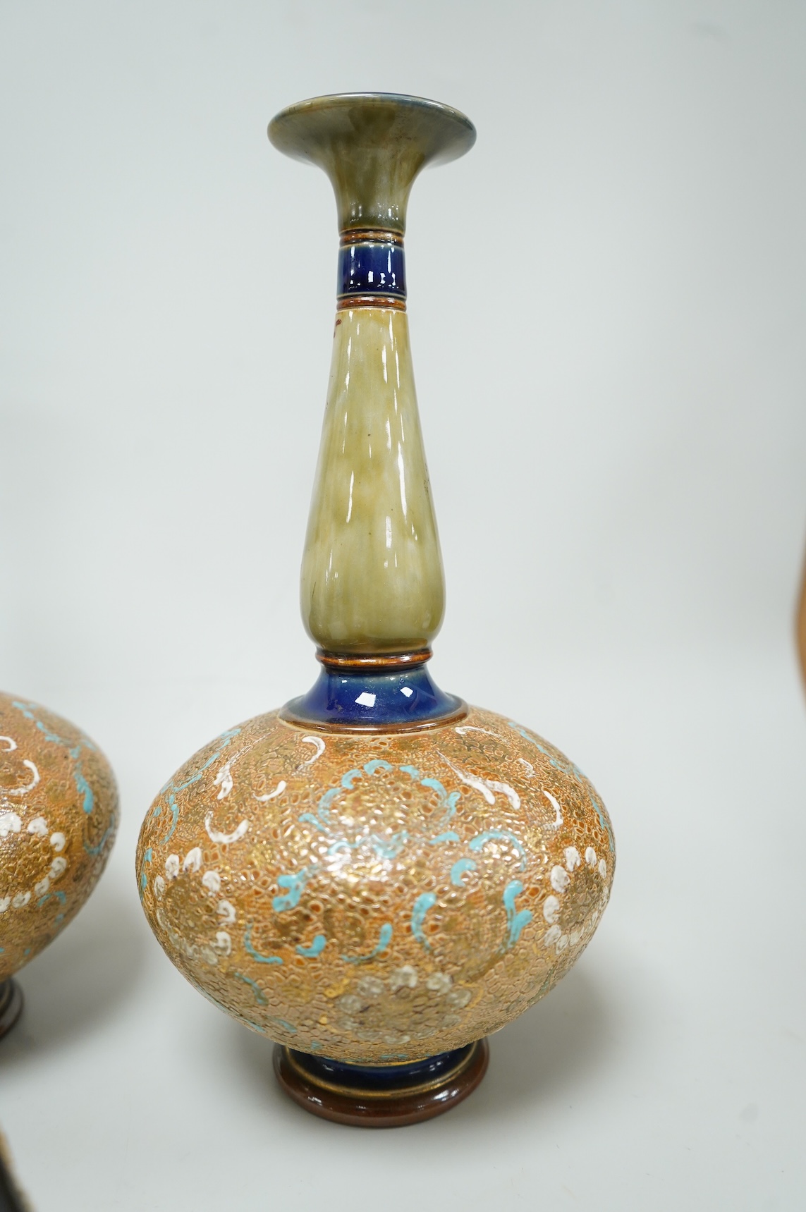 A pair of Royal Doulton Slater’s patent vases, 26cm high and pots and a jug together with a collection of miniature stoneware pots jugs and a pair of peppers